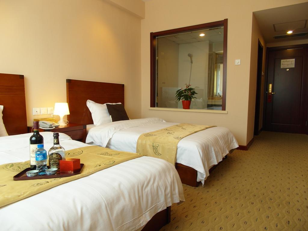 Tianjin Jinma Hotel Номер фото